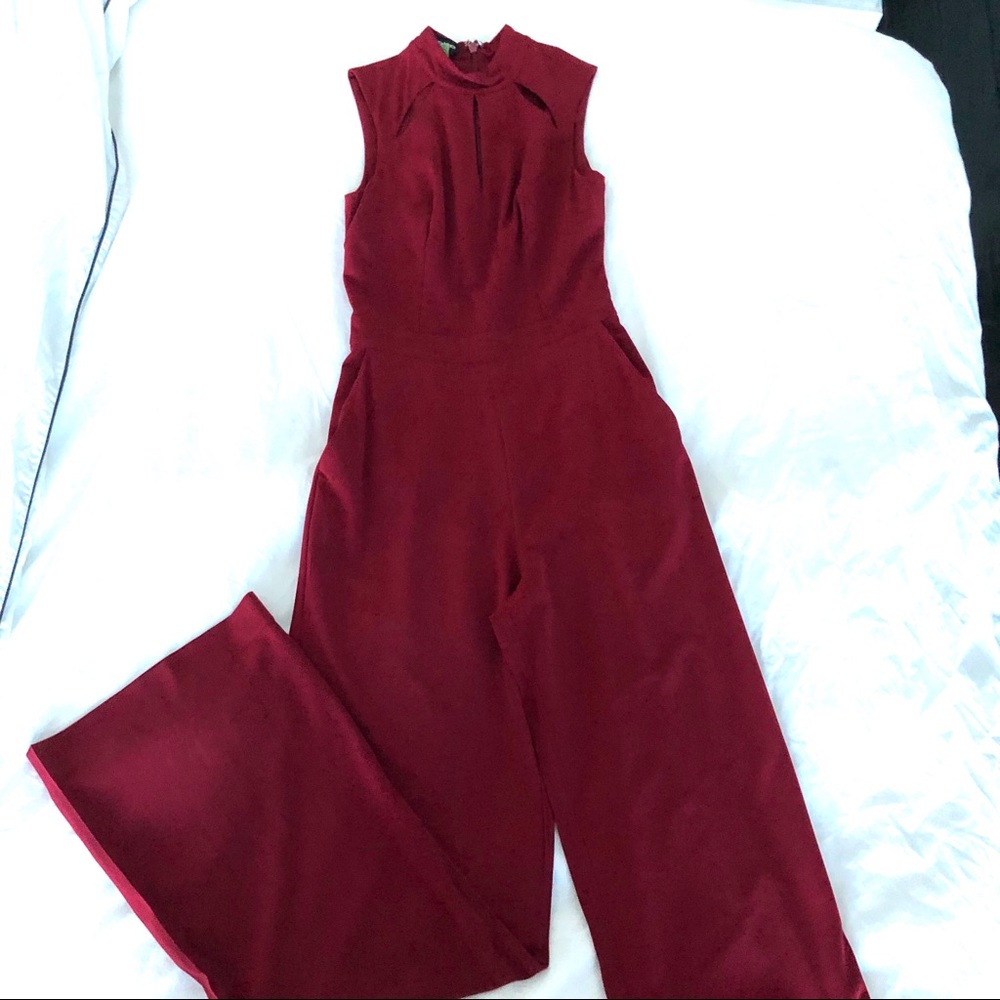 Bebe Red window colored jumpsuit